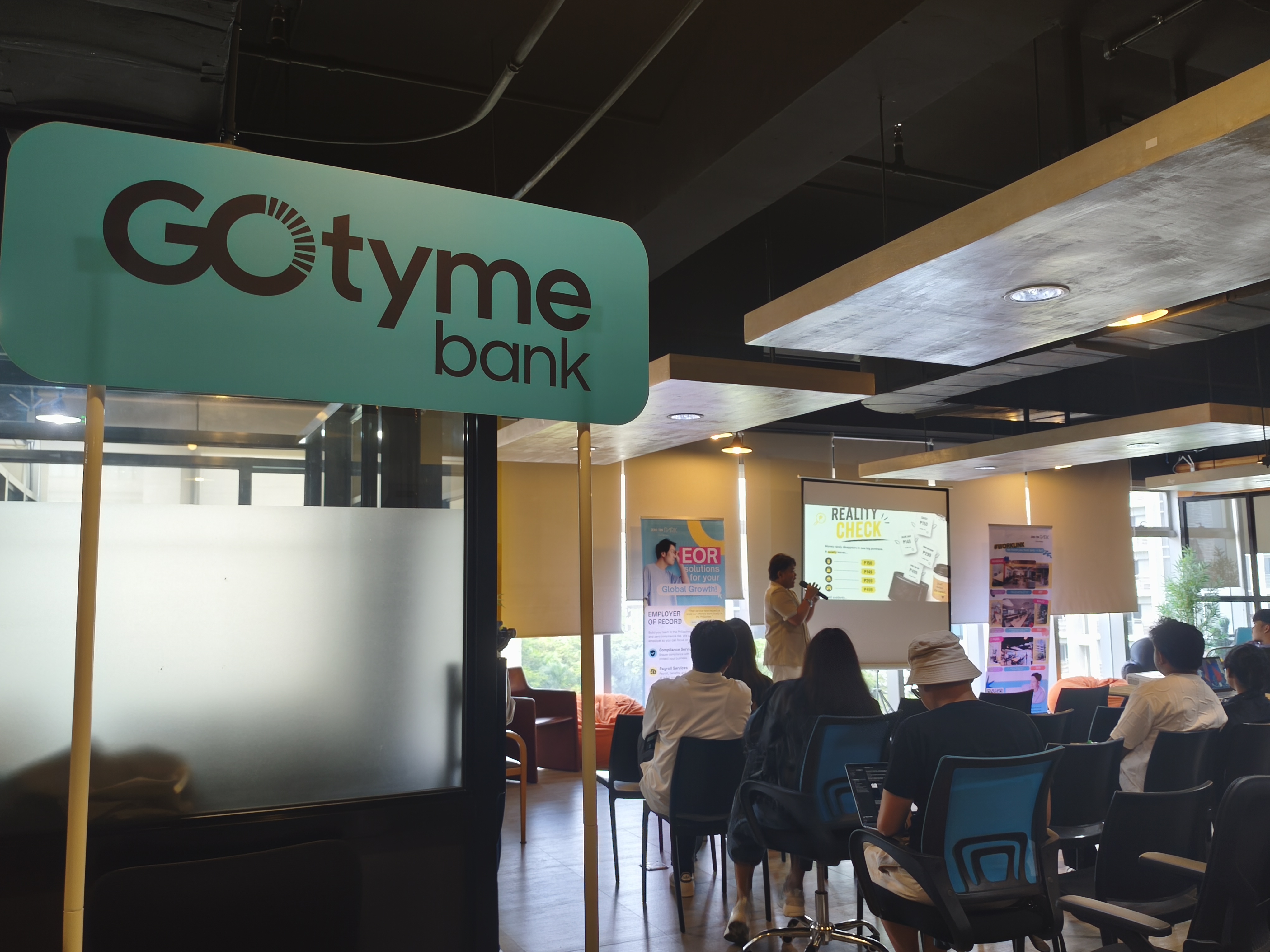Attendees networking at the GoTyme x Zero-Ten Park freelancer finance event in Cebu IT Park