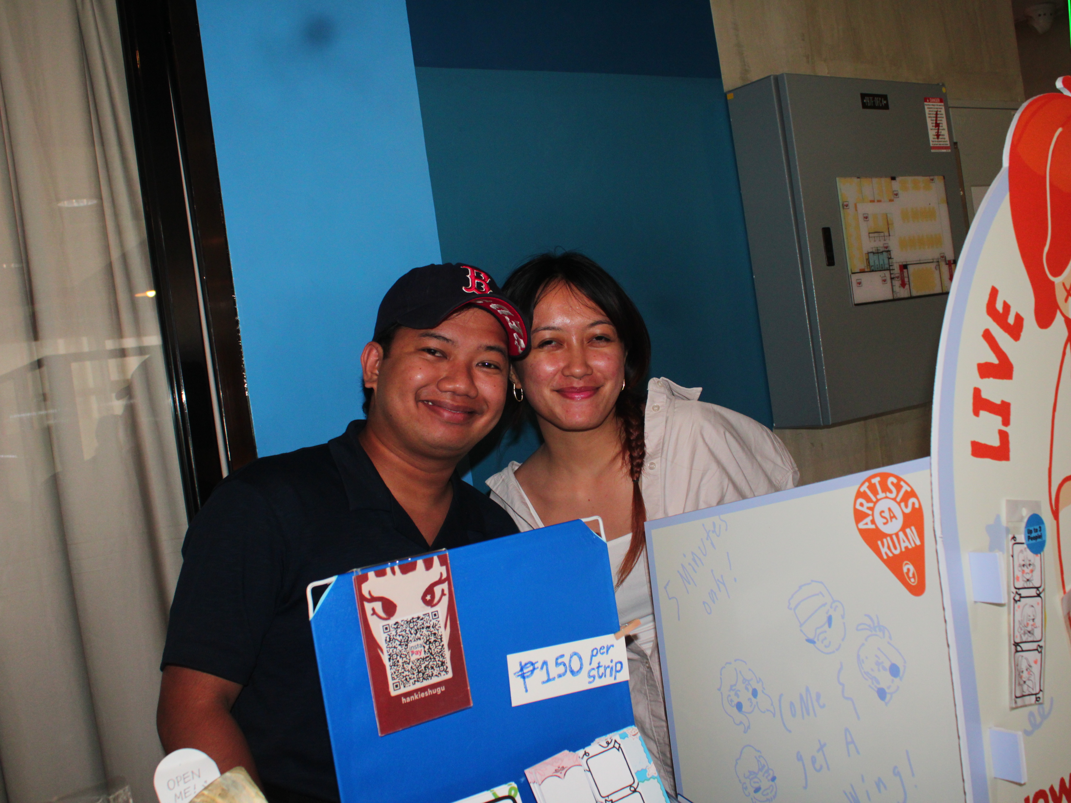 Artists Sa Kuan live drawing photobooth at the Notion Cebu workshop in Cebu IT Park